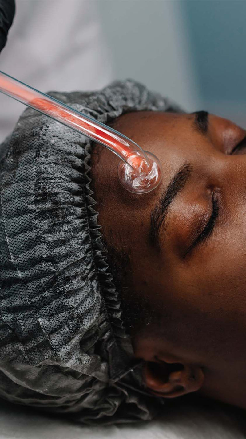 woman receiving laser skin therapy